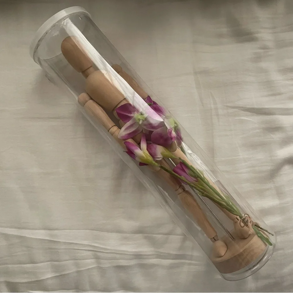 ikea gestalta artist’s wooden figure with flowers